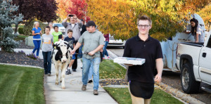 Bossy the Cow Delivers Smoky's Pizza